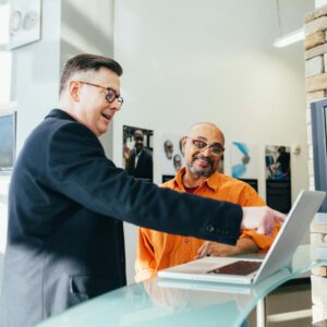 Man Pointing Laptop Computer